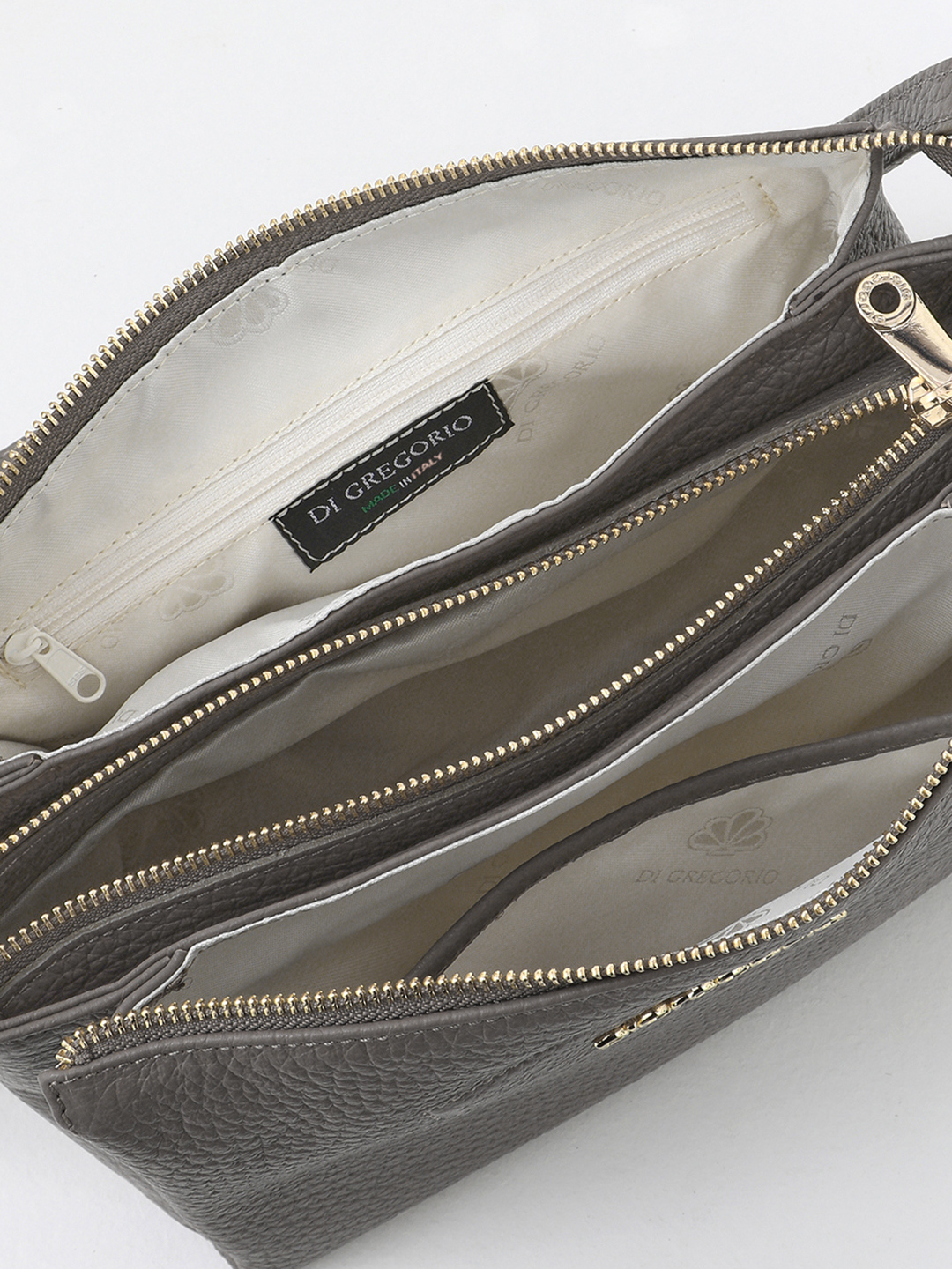 Кросс-боди с двумя кожаными пуллерами и металлическим логотипом Di Gregorio в цвете тауп