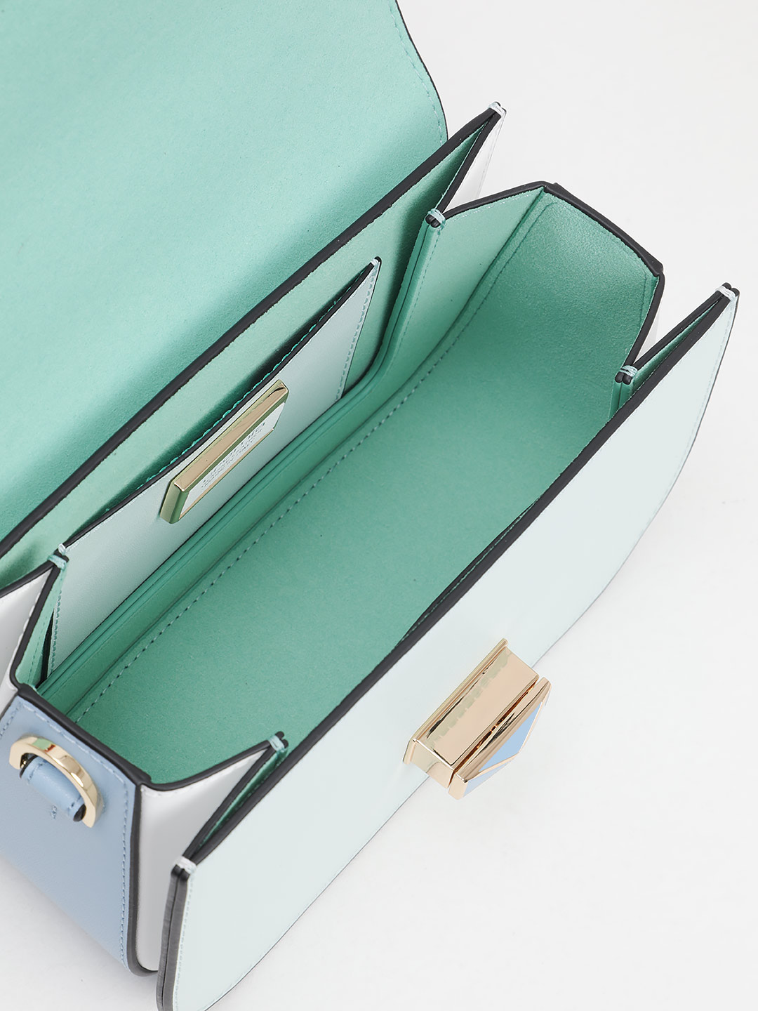 Маленькая сумка с поворотным замком на фирменной пряжке от Cromia из голубой кожи