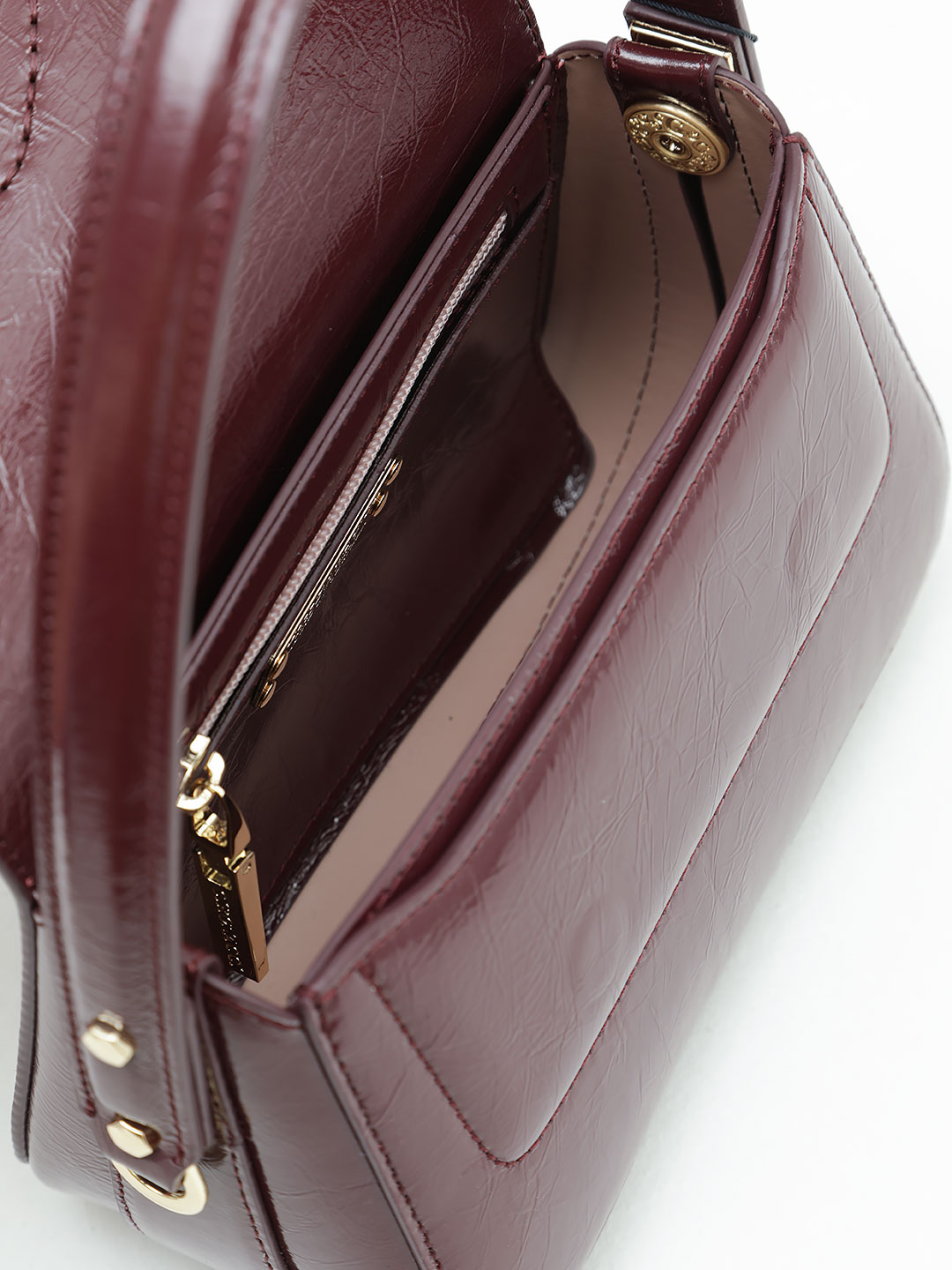 Небольшая сумка-багет с вышитой буквой "G" на клапане от Gironacci из лакированной кожи винного цвета