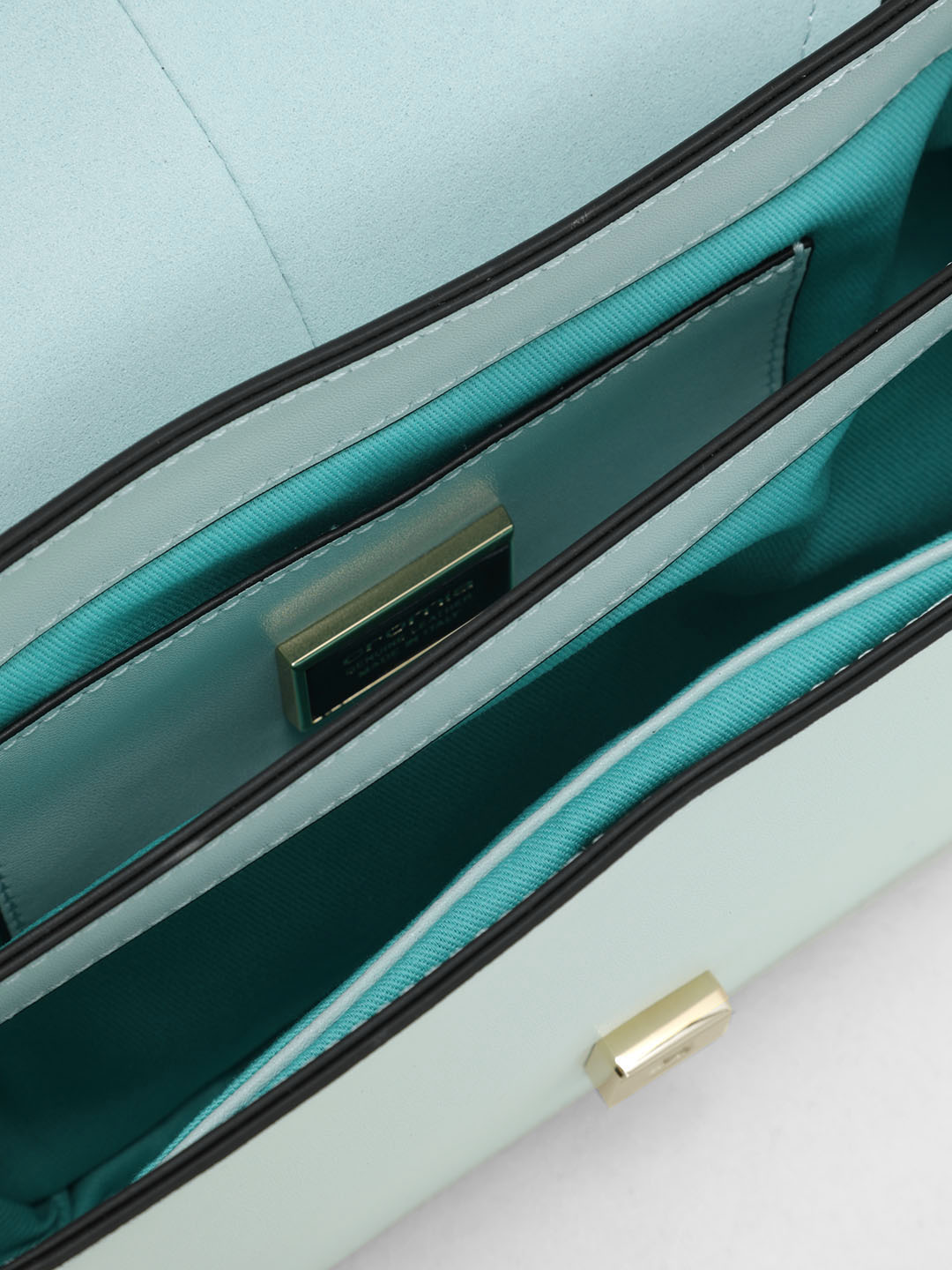 Небольшая сумка через плечо от Cromia из натуральной кожи голубого цвета