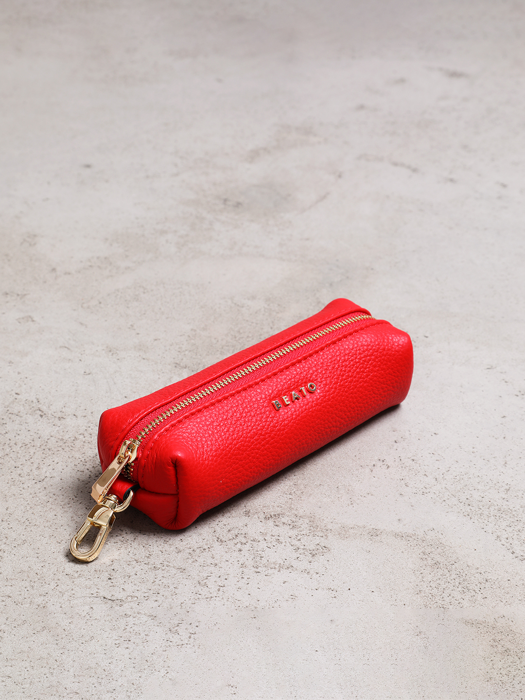 Ключница с золотистой фурнитурой от Alessandro Beato в красном цвете