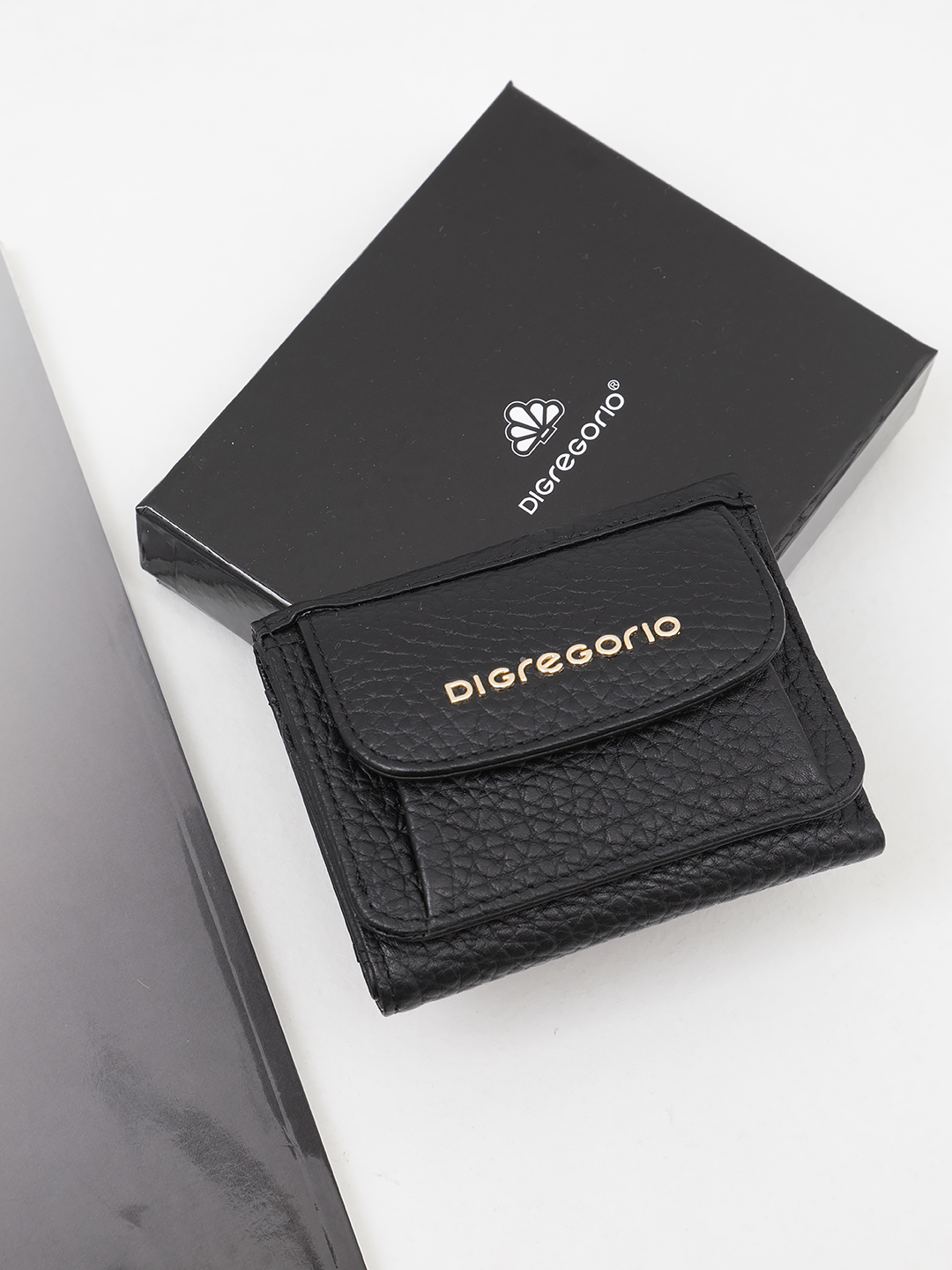 Женский мини кошелёк Di Gregorio из черной крупнозернистой кожи с монетницей